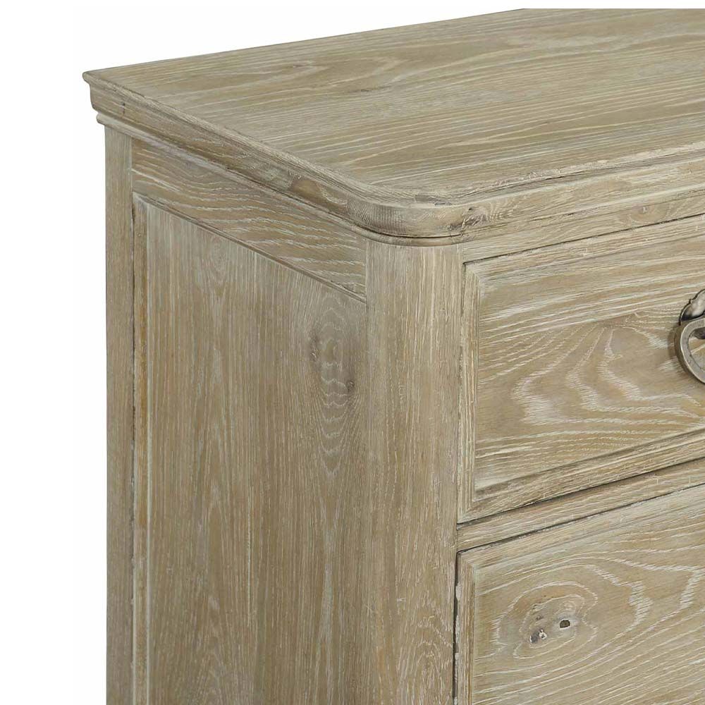 An 8-drawer dresser in a luxurious, natural finish that's perfect for rustic and chic spaces