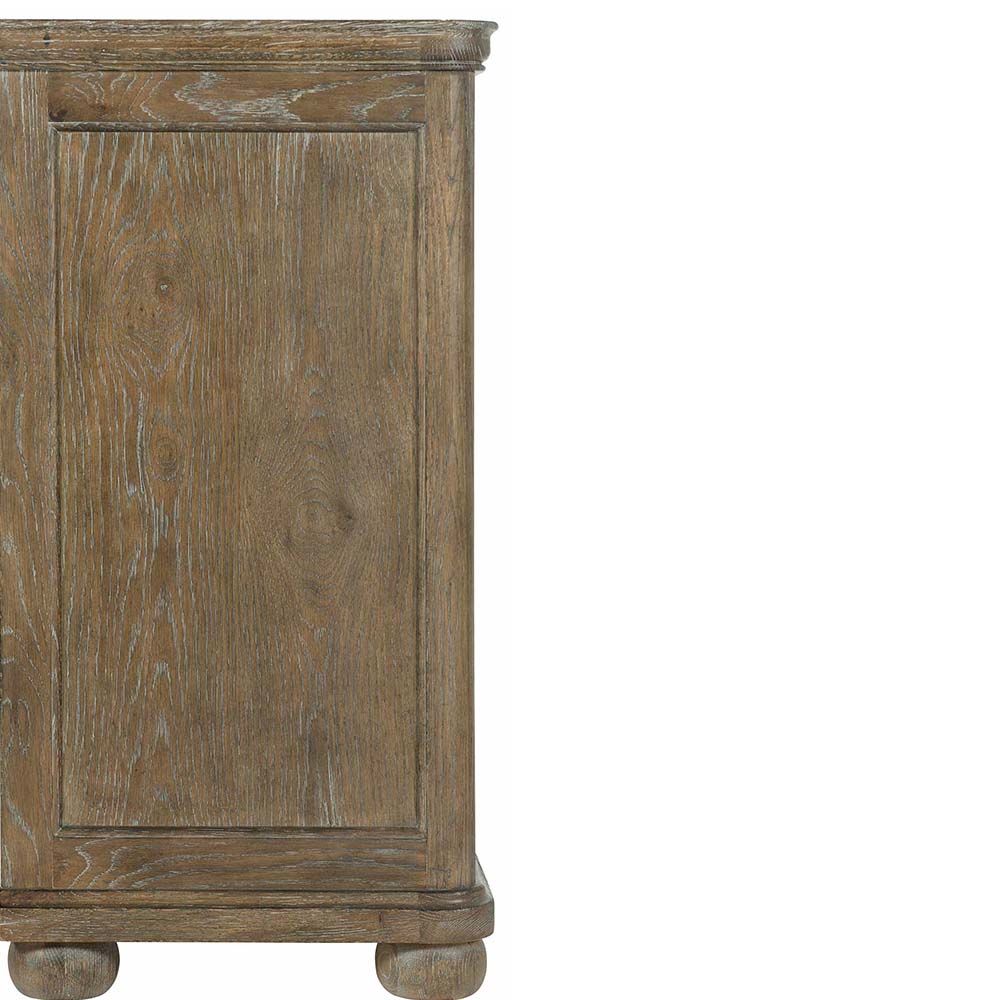Subtle 8-drawer dresser in a light, natural wood finish