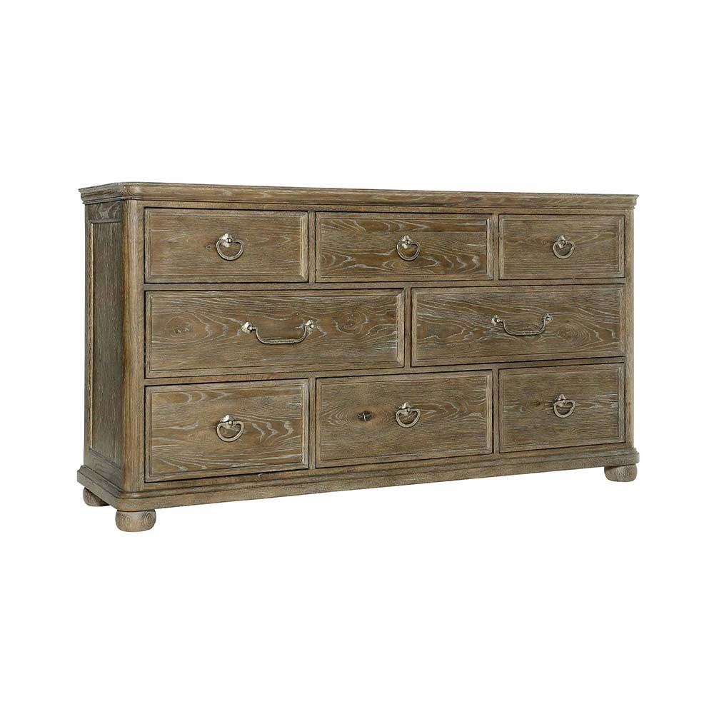 Subtle 8-drawer dresser in a light, natural wood finish