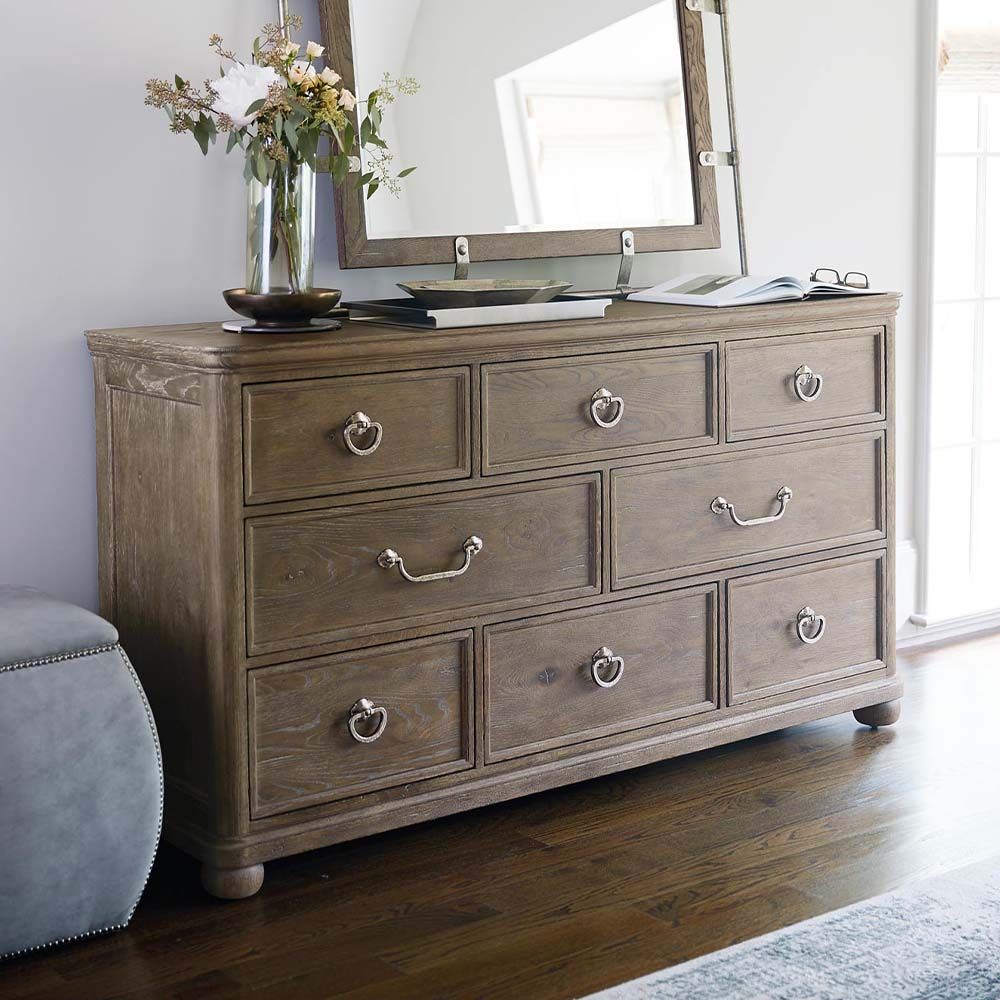 Subtle 8-drawer dresser in a light, natural wood finish