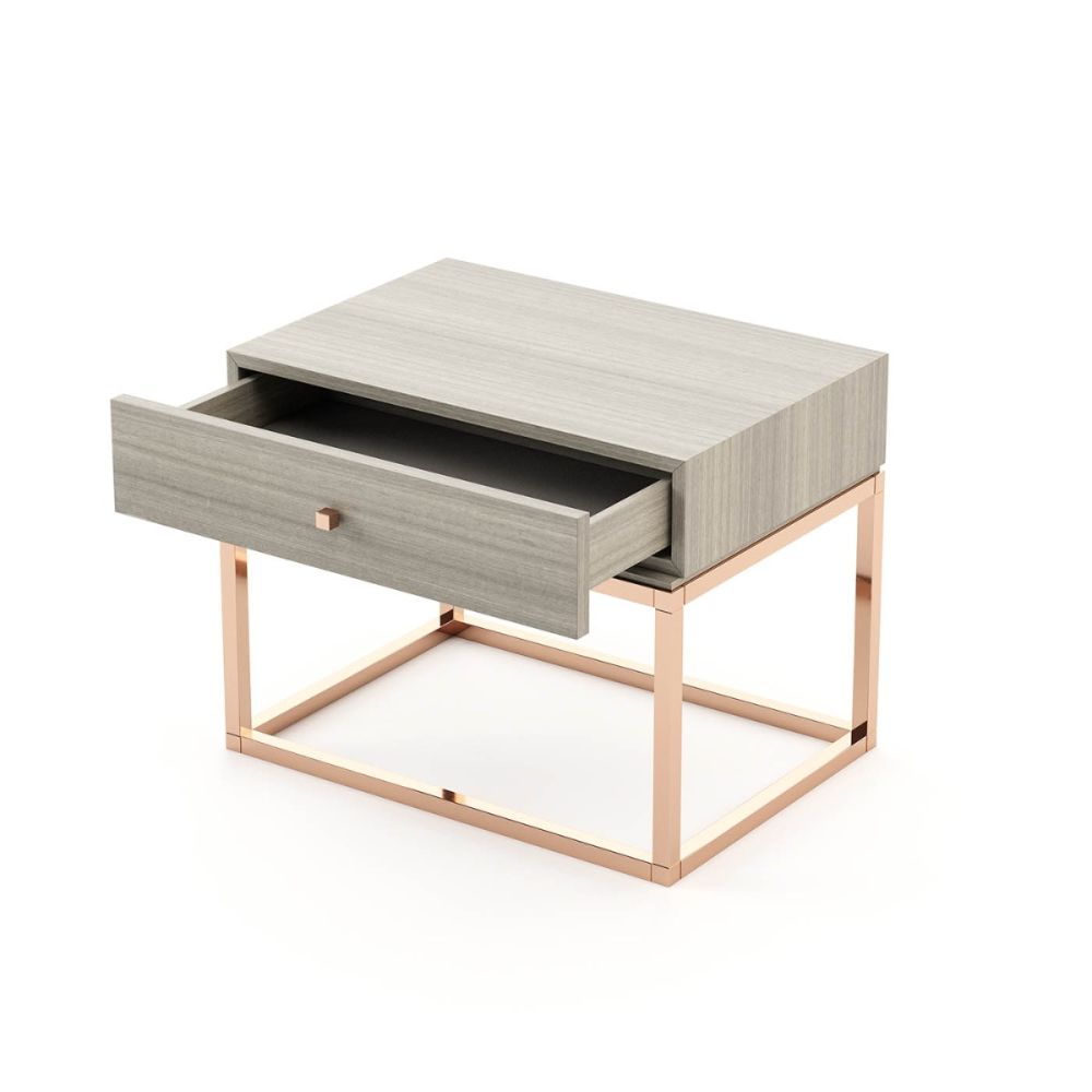 A modern grey bedside table with a copper base and details