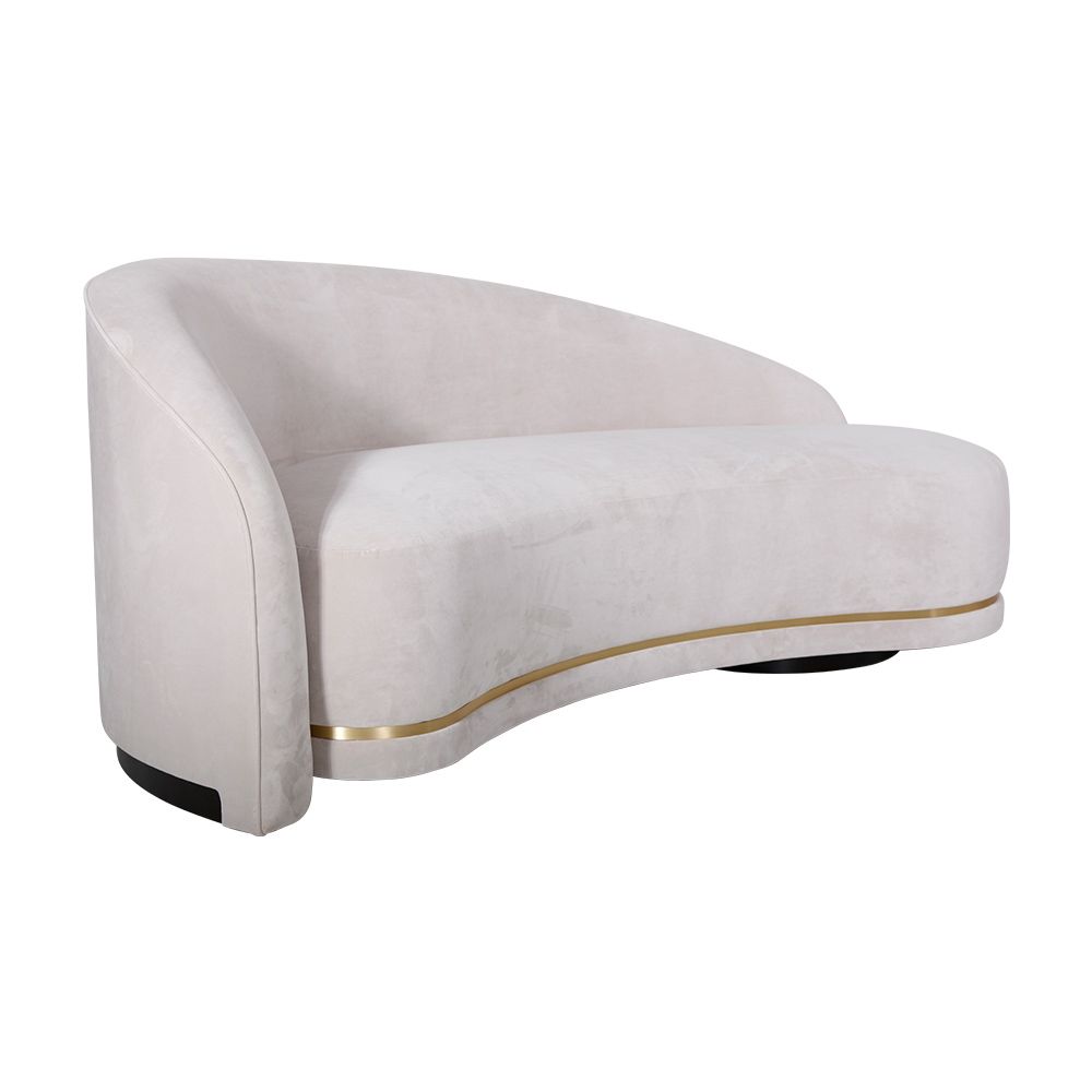 A luxurious Art Deco-inspired sofa with brass-effect detailing.