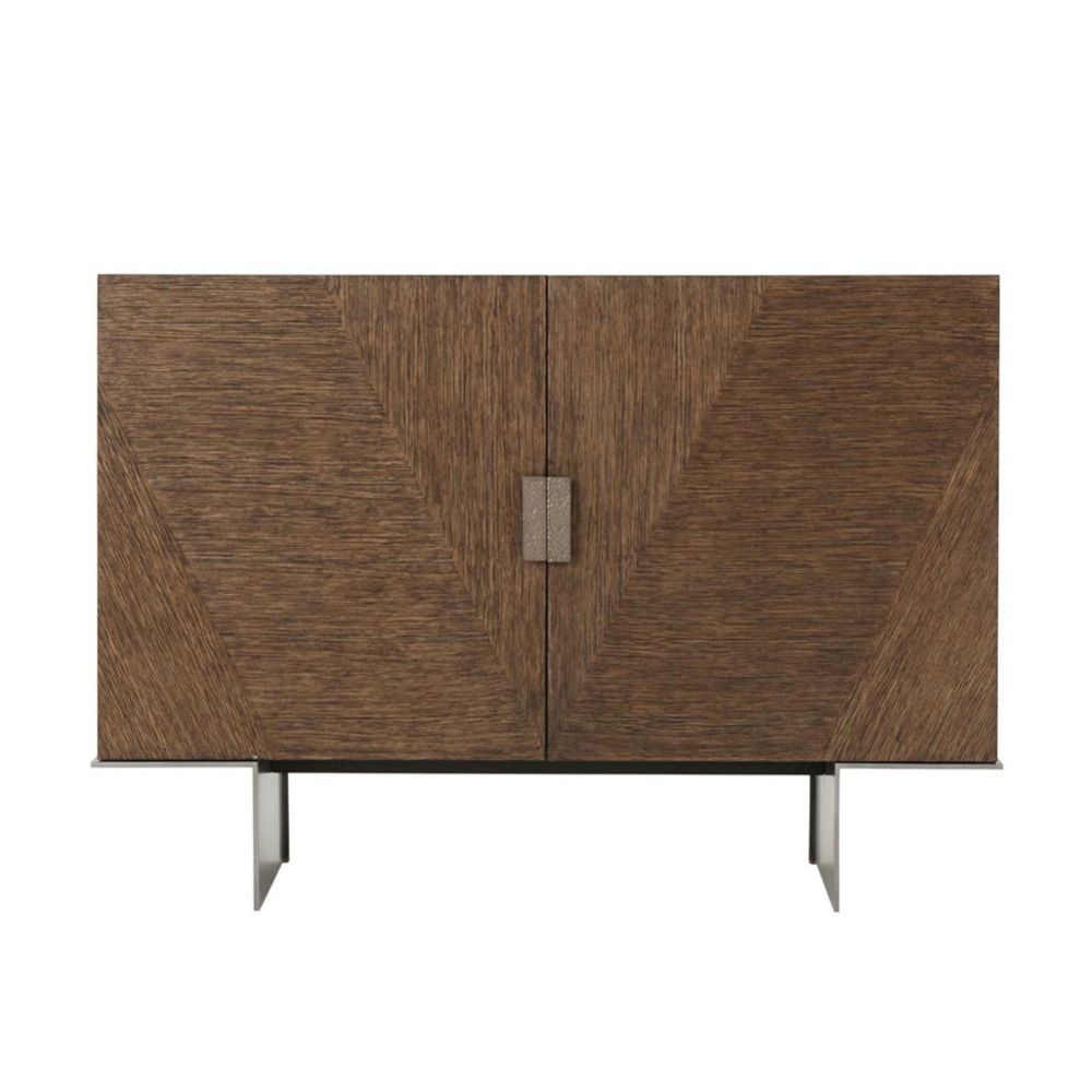 Luxurious cabinet with subtle parquet style doors and brass handles
