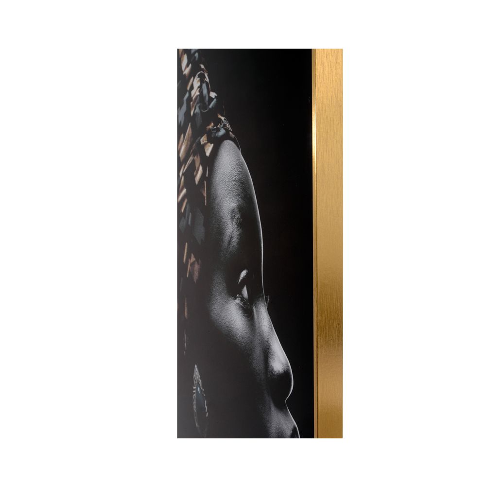 gold framed glass wall art piece of an African woman