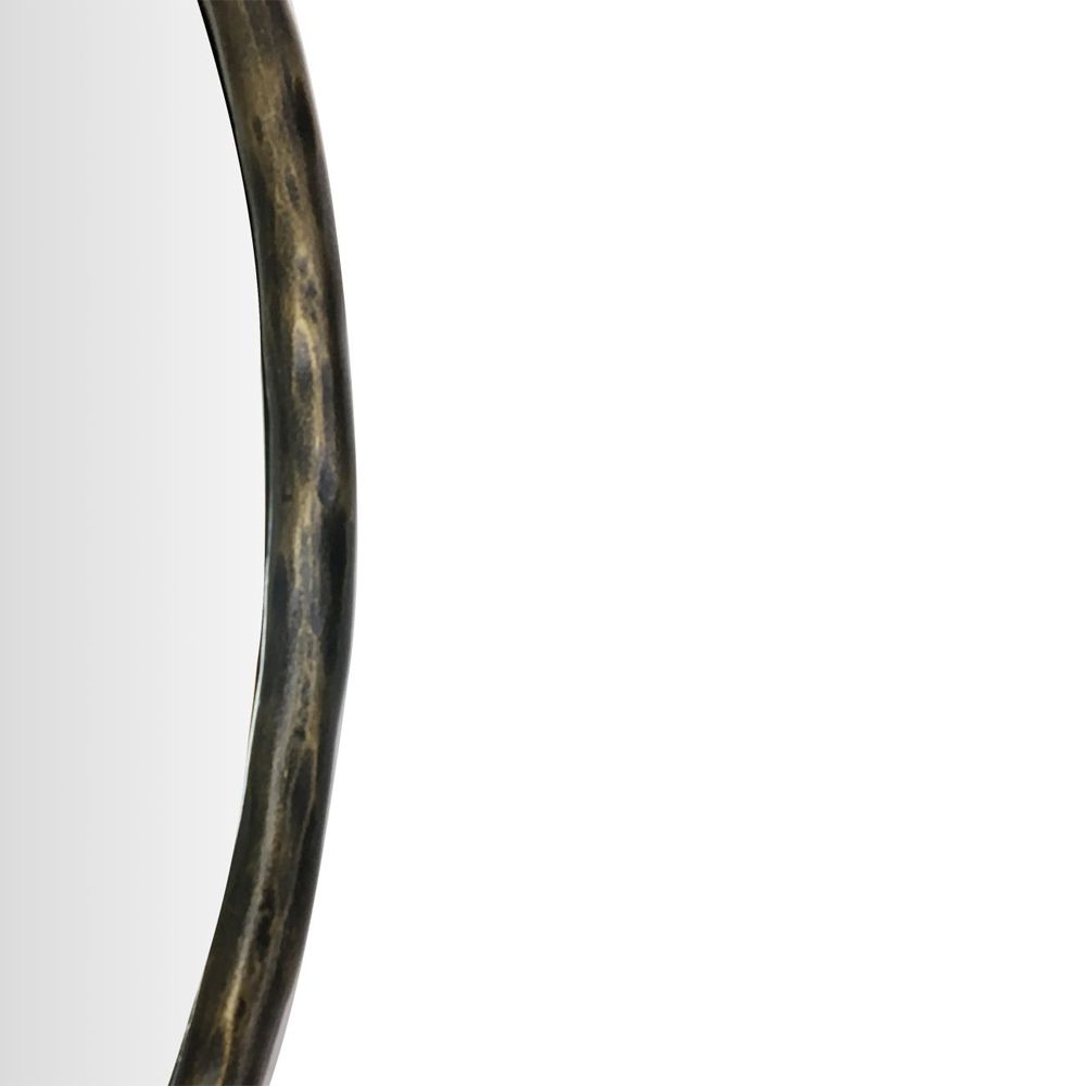 A luxurious round antique bronze mirror