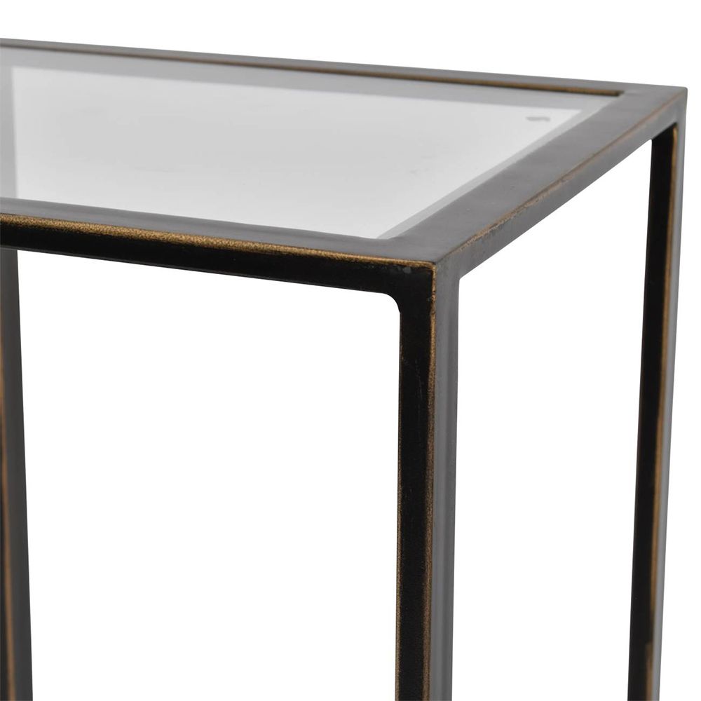 A contemporary console table with a unique design and differing shelf heights