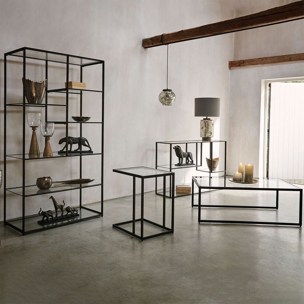 A contemporary console table with a unique design and differing shelf heights