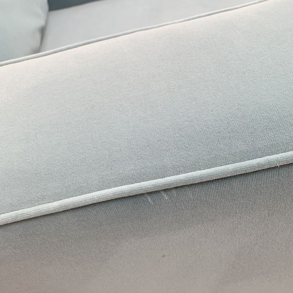 Alderley armchair with a mineral blue and velvet finish. Simple and chic