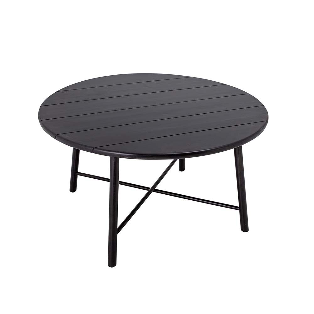 A sophisticated, rounded dining table made from black stained acacia wood