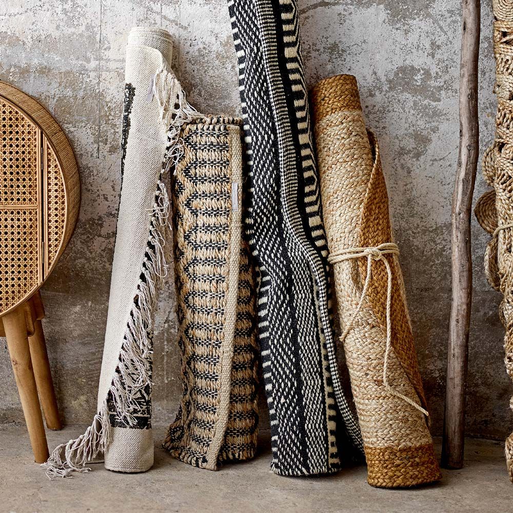 A simple yet chic circular rug crafted from jute and cotton