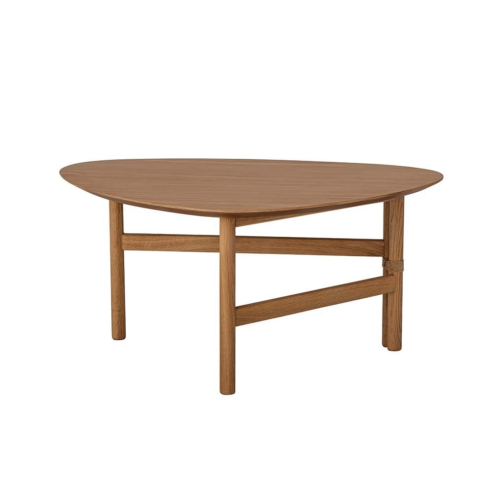 A simplistic coffee table with rope details and an organic shaped top