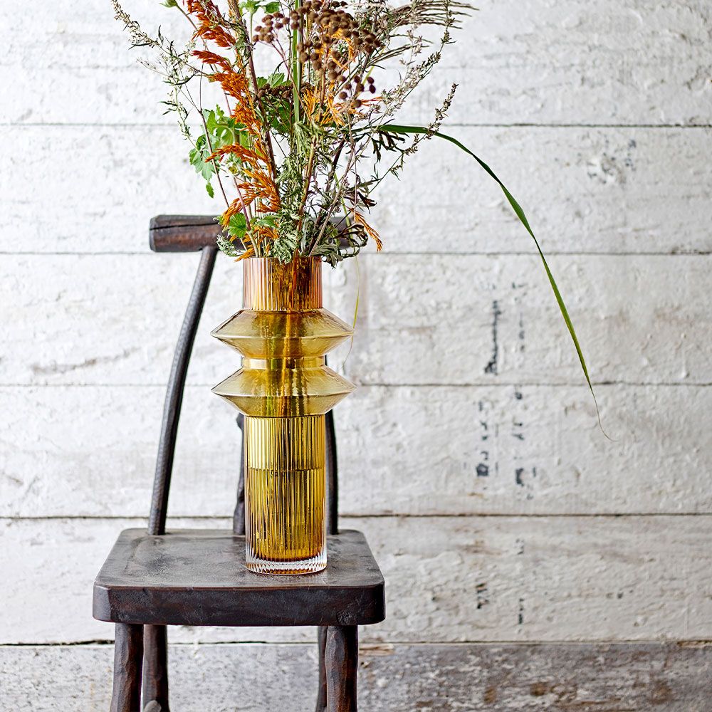 A charming pedestal by Bloomingville crafted from recycled wood