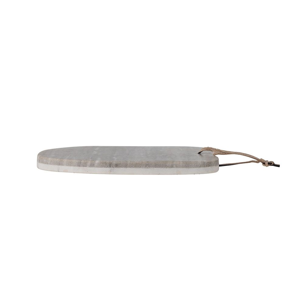 Elegant marble cutting board featuring organic shape