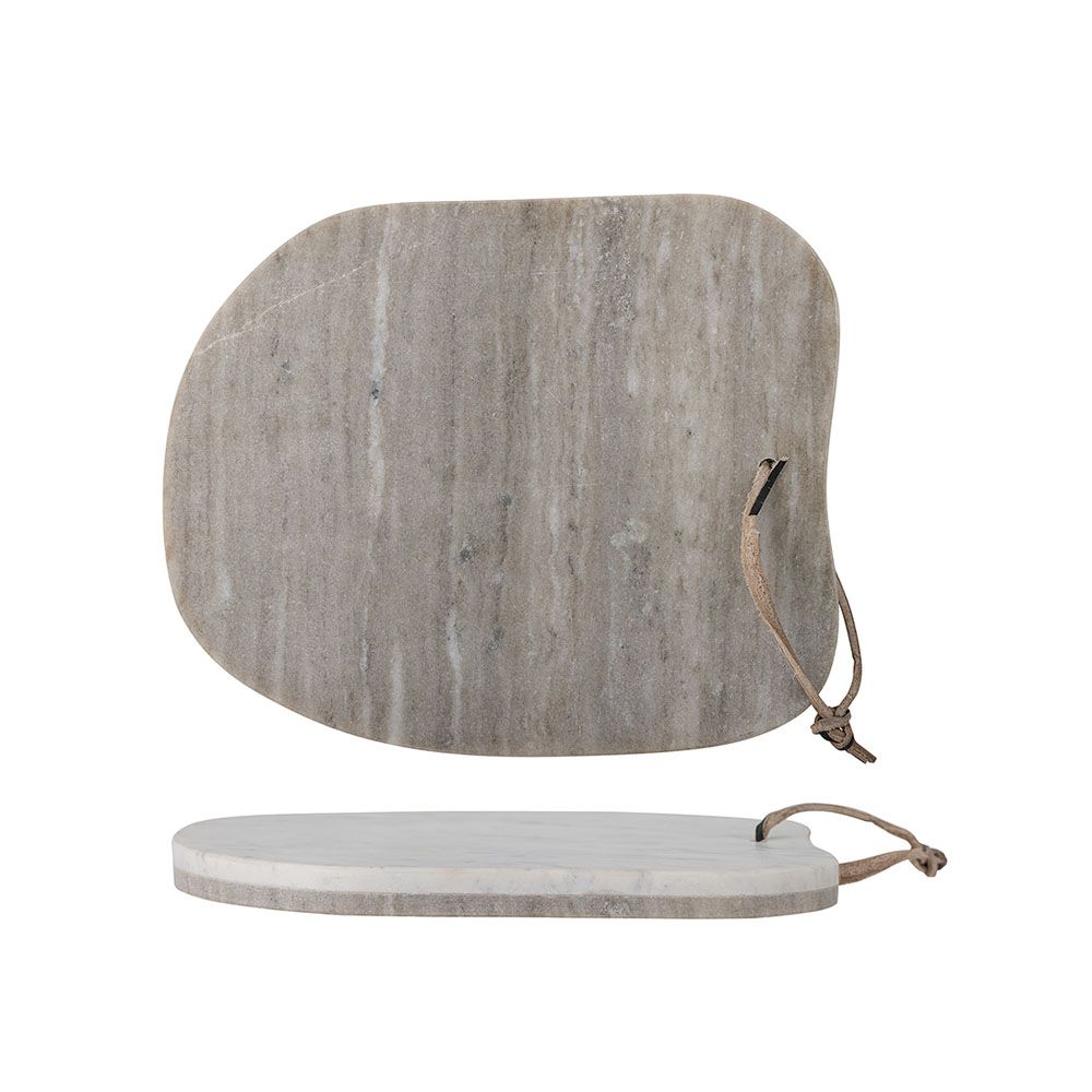 Elegant marble cutting board featuring organic shape