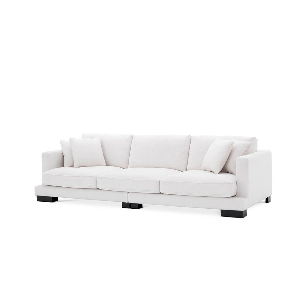 Luxurious large Eichholtz sofa with black feet, available in white, grey and sand
