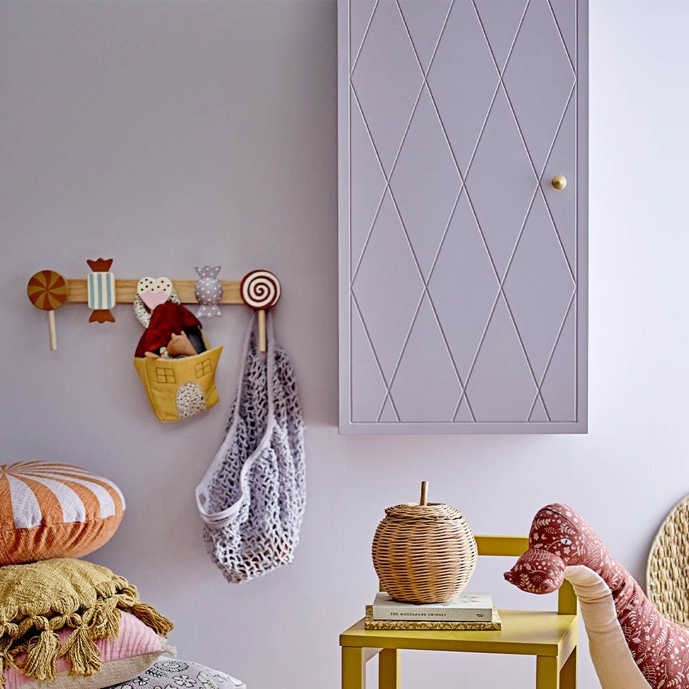 Gorgeous lilac storage cabinet with embossed diamond pattern and brass handle