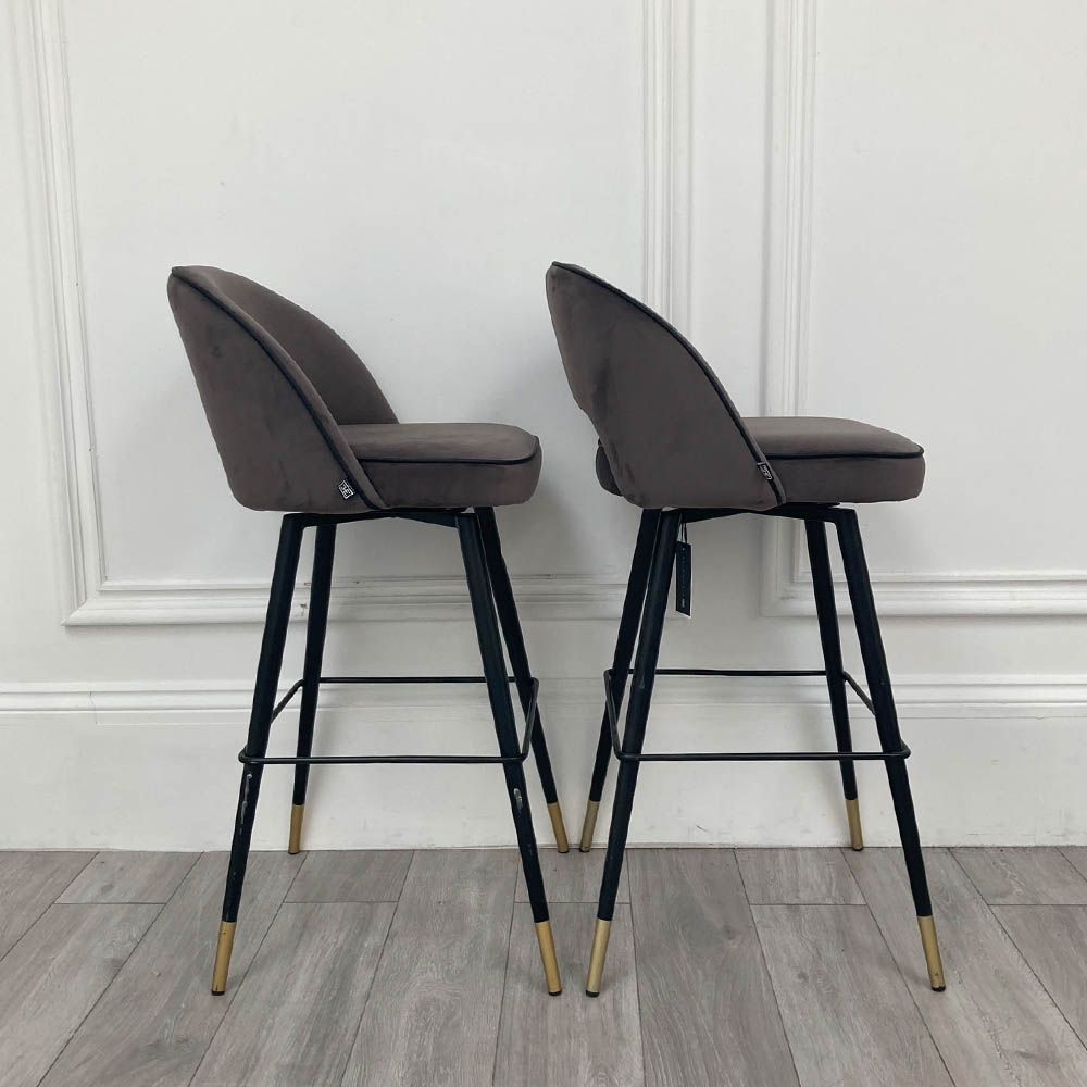 Sumptuous Pair of dark grey bar stools with black tapered legs and gold feet