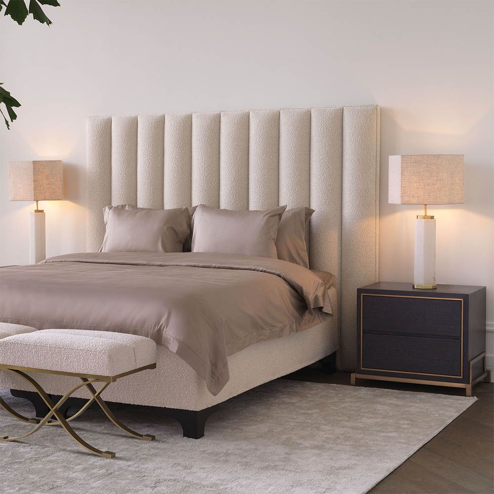 Elegant modern bedside table with dazzling brass details.