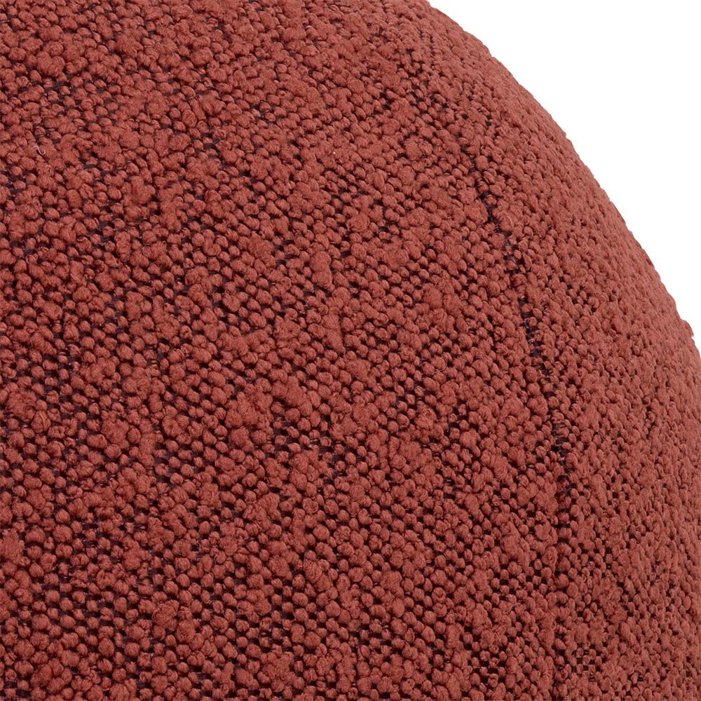 Dreamy rouge cushion with spherical shape and boucle texture