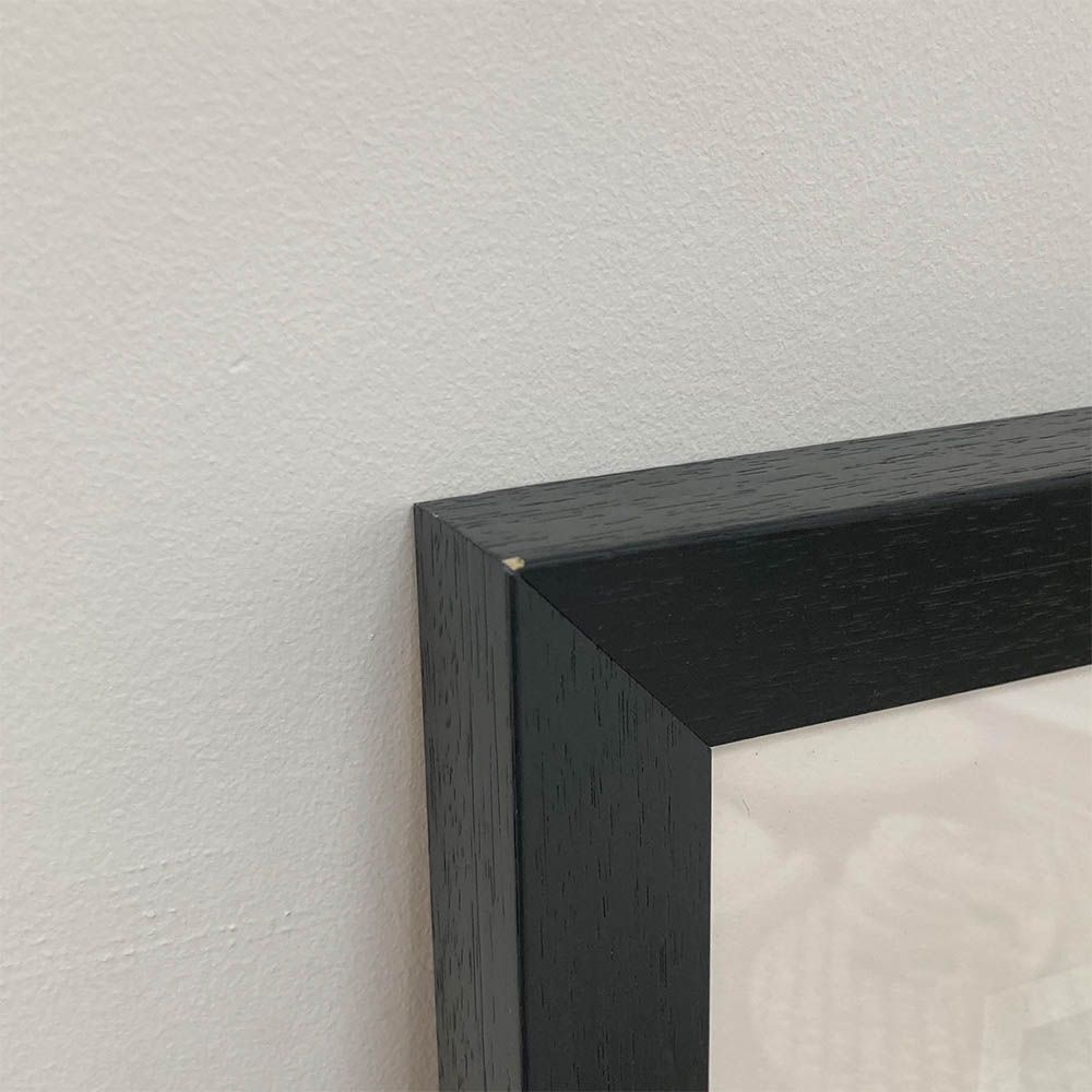 Abstract black and white print with black frame