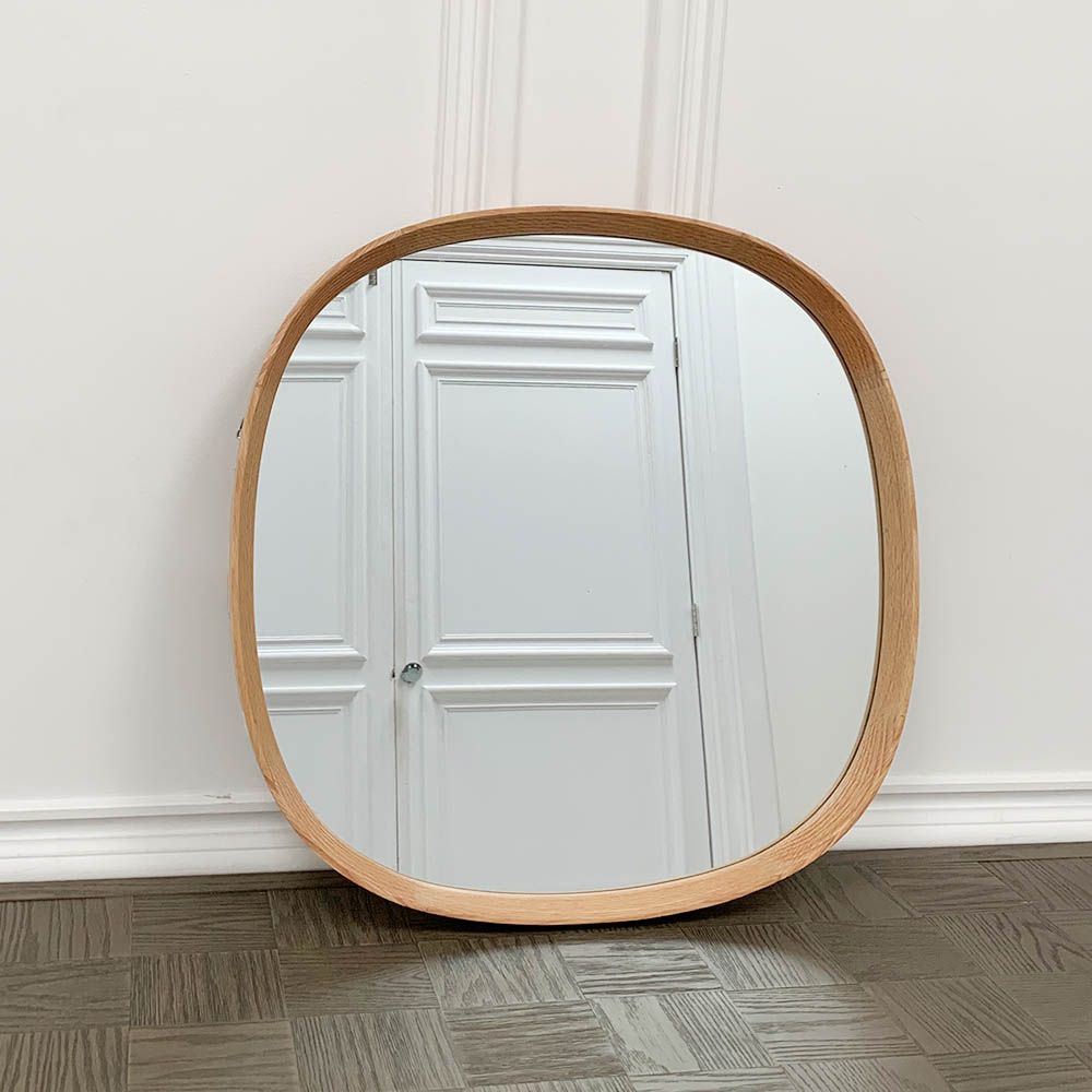 Scandi-inspired rounded mirror with wooden frame