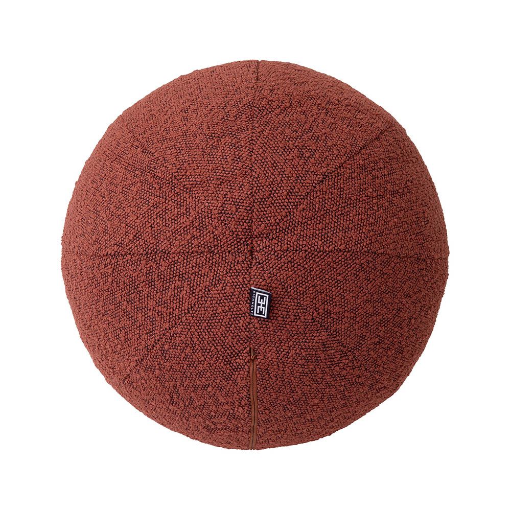 Dreamy rouge cushion with spherical shape and boucle texture
