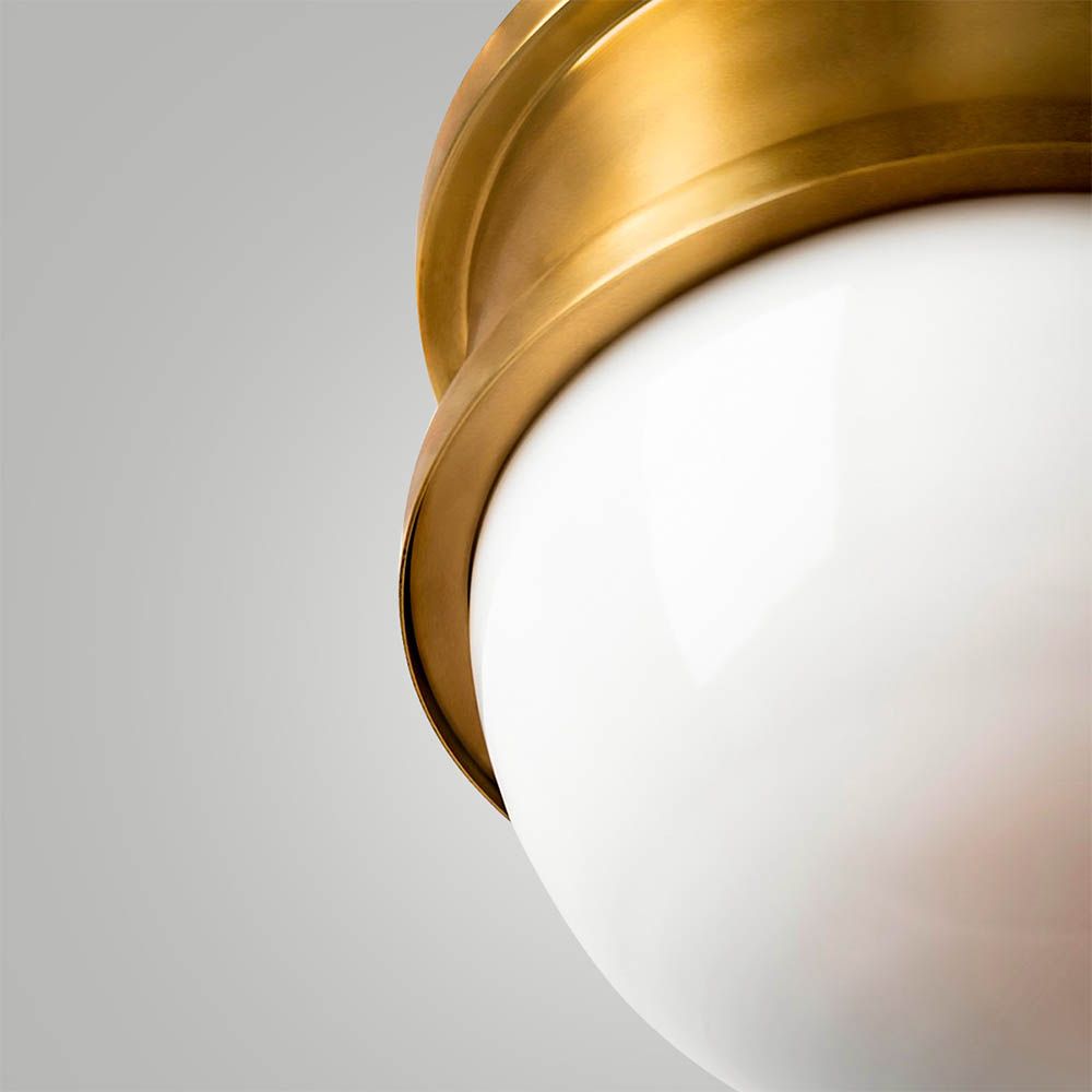 Elegant hanging light fixtures with brass accents