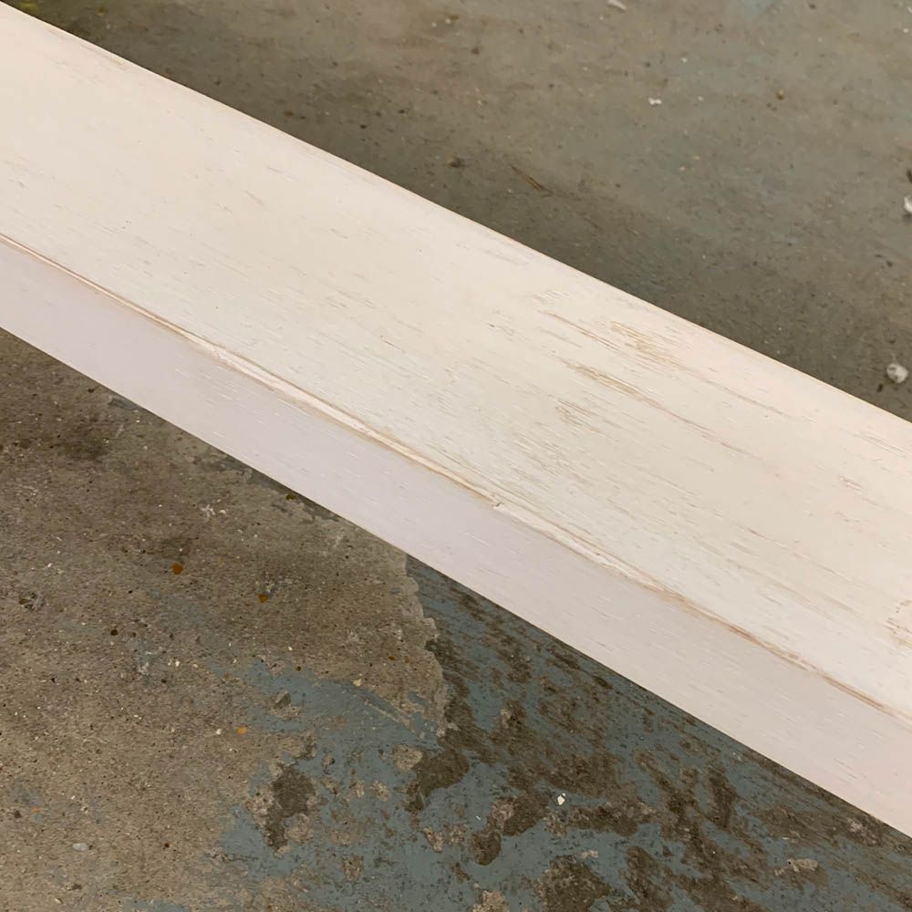 Imperfections to brushed white finish