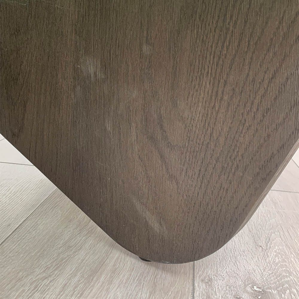 Slight scuffs to the wood finish