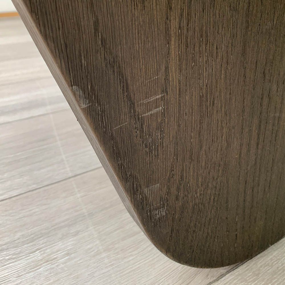 Slight scuffs to the wood finish