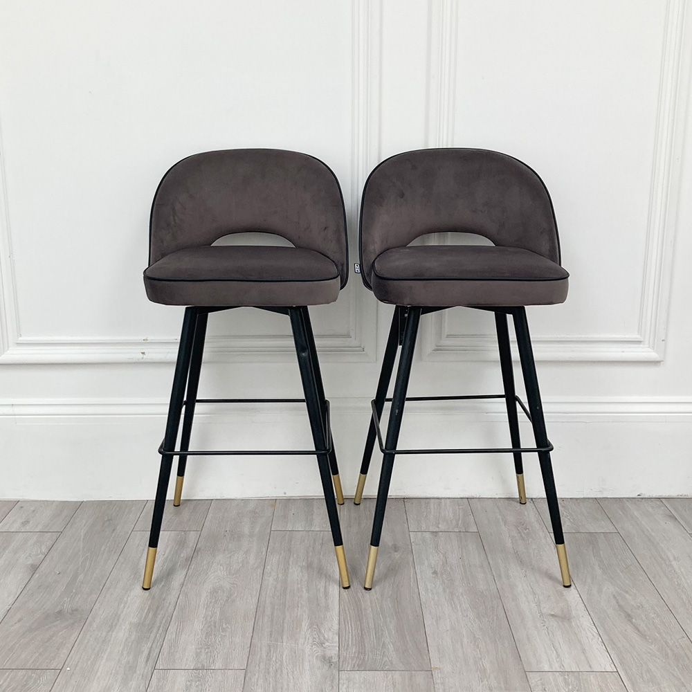 Sumptuous Pair of dark grey bar stools with black tapered legs and gold feet