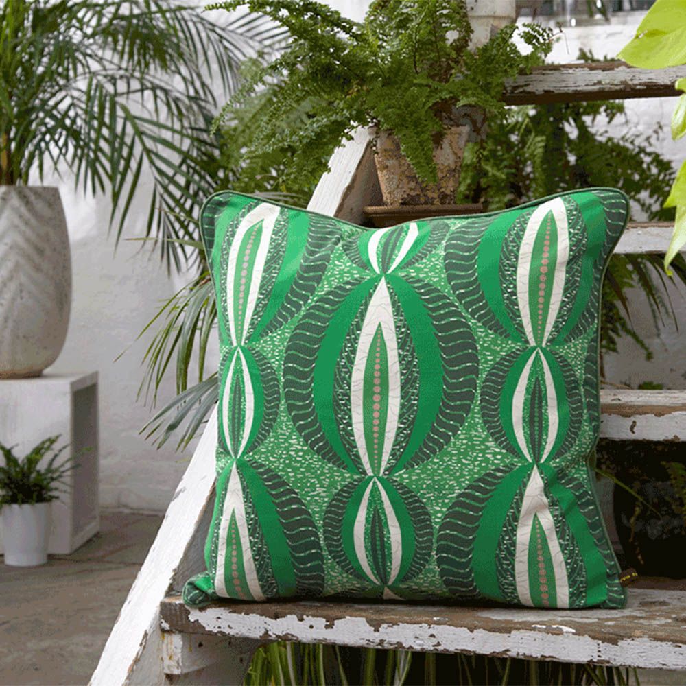 Striking cushion with mesmerising green printed pattern 