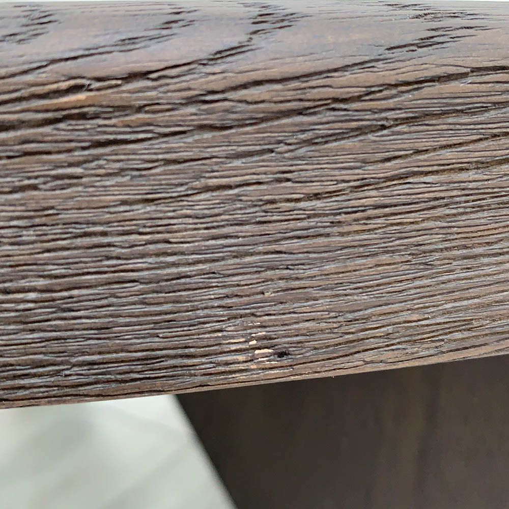 Slight scuffs to the wood finish