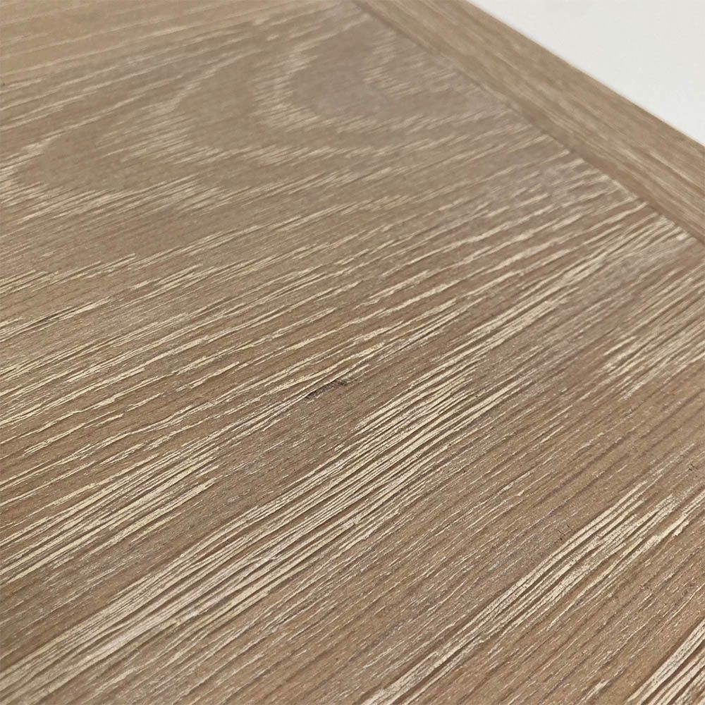 A stunning natural whitewash oak three-drawer chest with brass details
