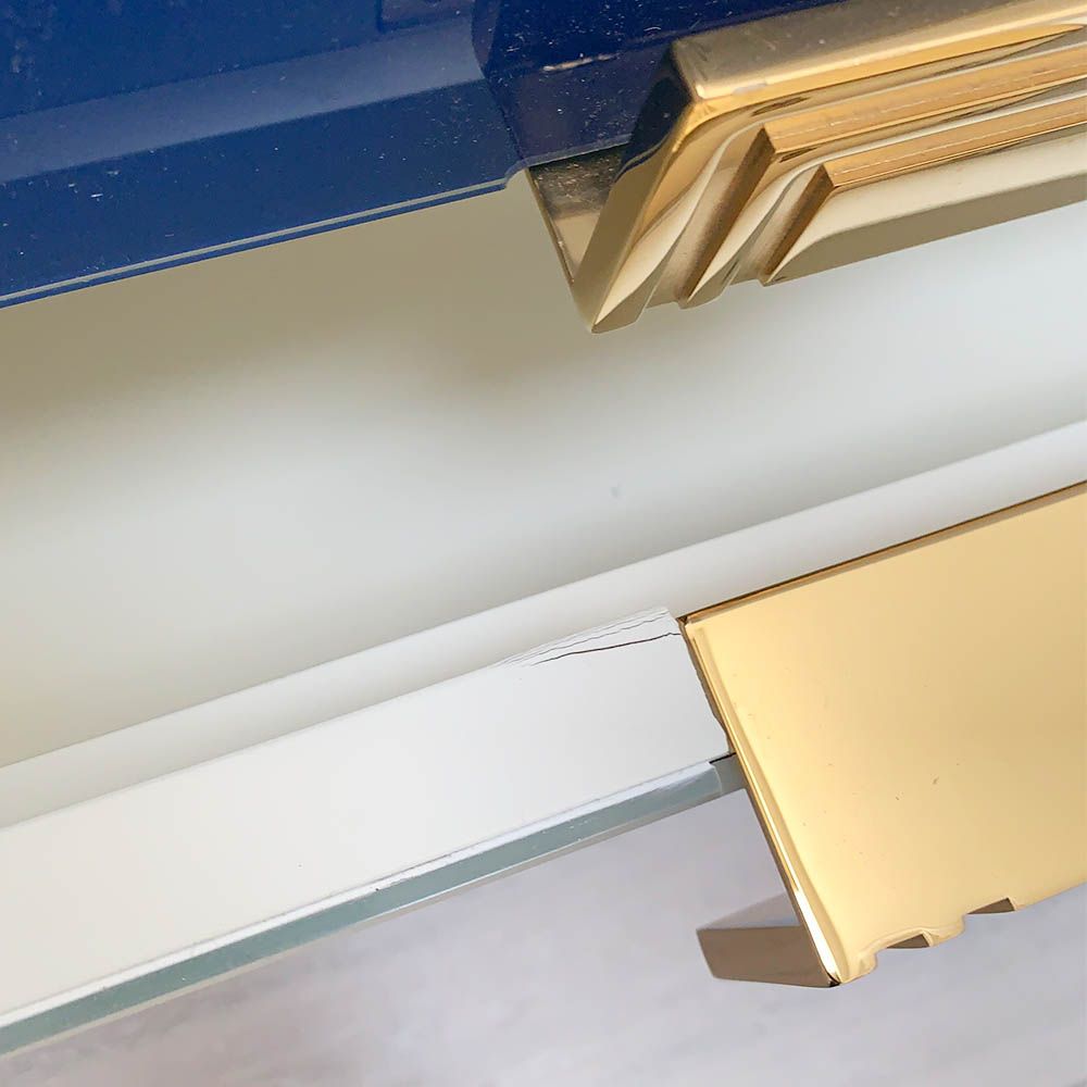 Glamorous geometric design credenza with blue glass shapes