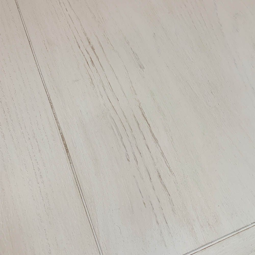 Imperfections to brushed white finish
