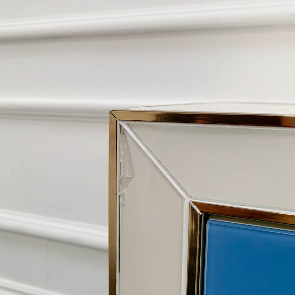 Glamorous geometric design credenza with blue glass shapes