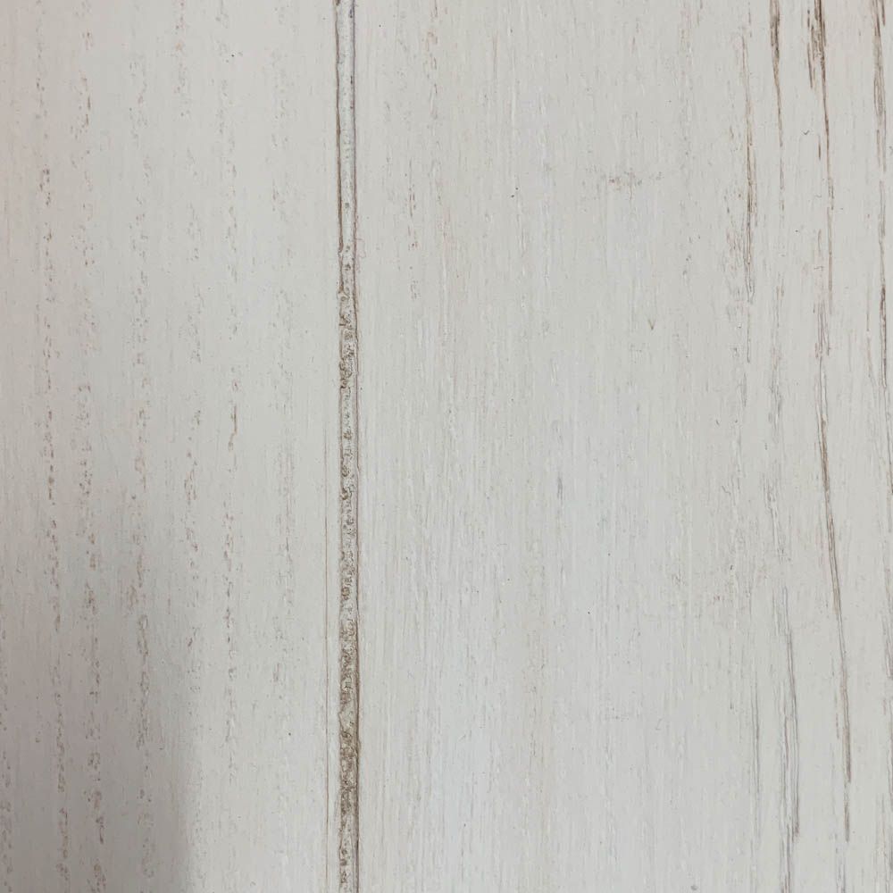 Imperfections to brushed white finish