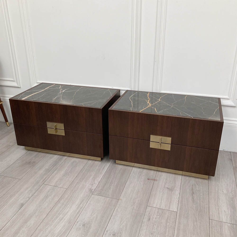 Light brown bedside table with two drawers, brass details and a marble top