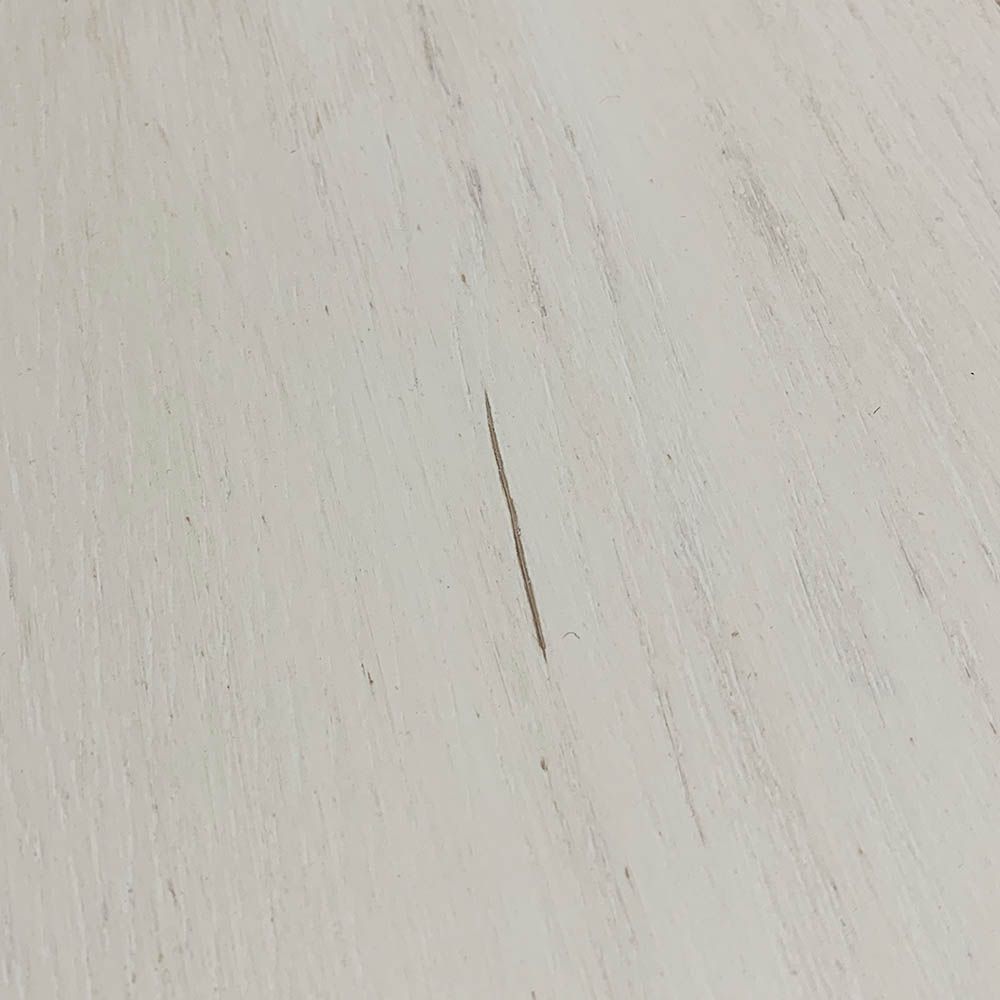 Imperfections to brushed white finish