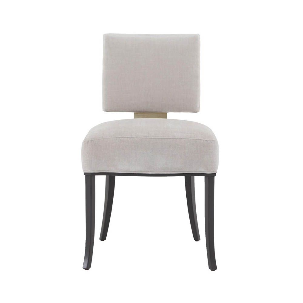 Modern designer armchairs with champagne finish back detail