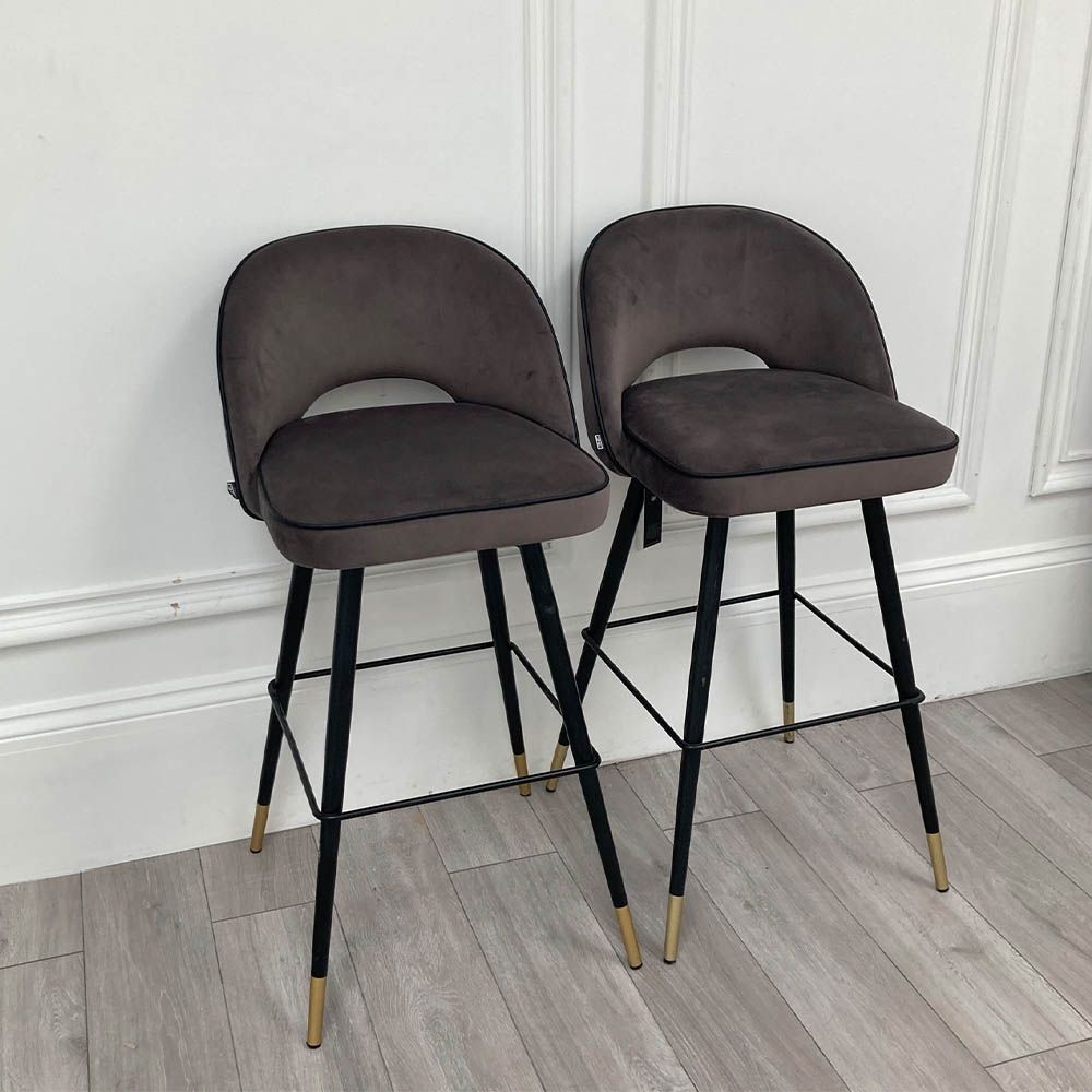 Sumptuous Pair of dark grey bar stools with black tapered legs and gold feet