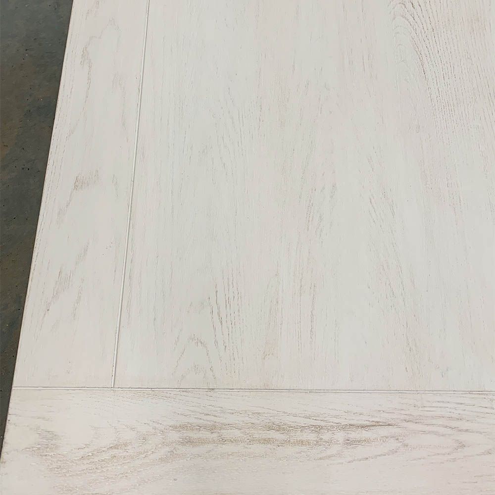 Imperfections to brushed white finish