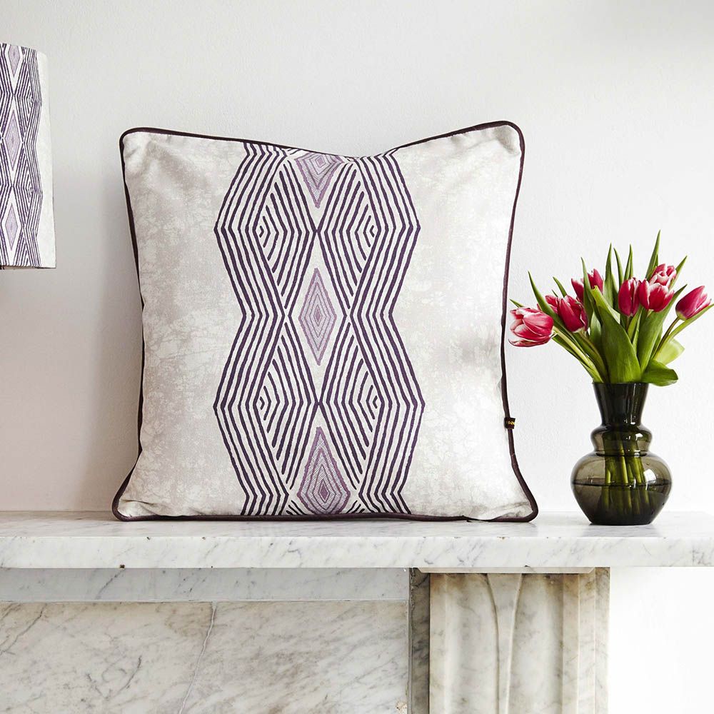Contemporary cushion with purple design inspired by African textiles