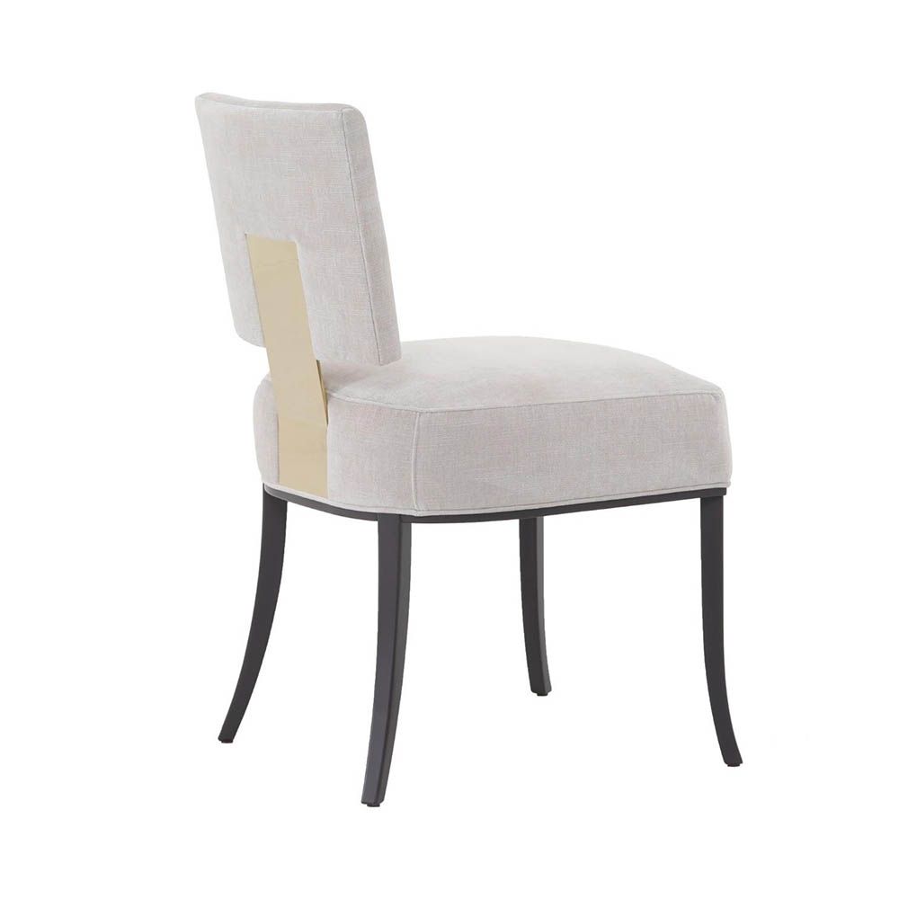 Modern designer armchairs with champagne finish back detail