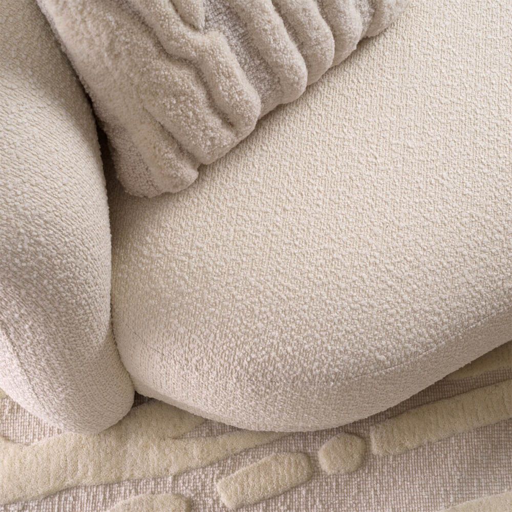 Cosy wool and boucle textured cushion in cream