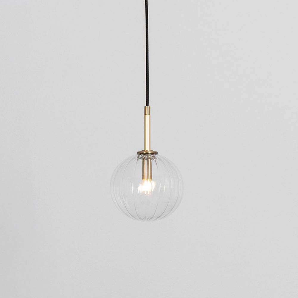Textured clear glass globe pendant ceiling light with natural brass fixture