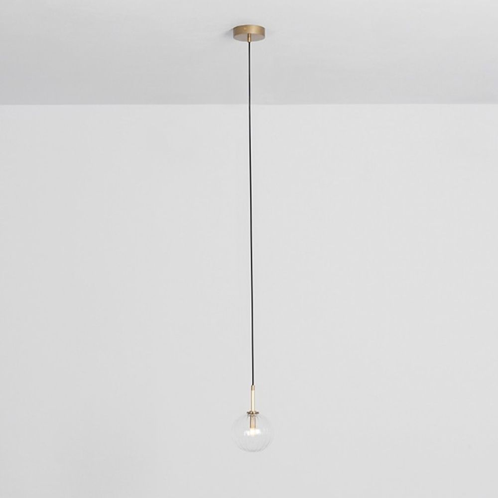 Textured clear glass globe pendant ceiling light with natural brass fixture