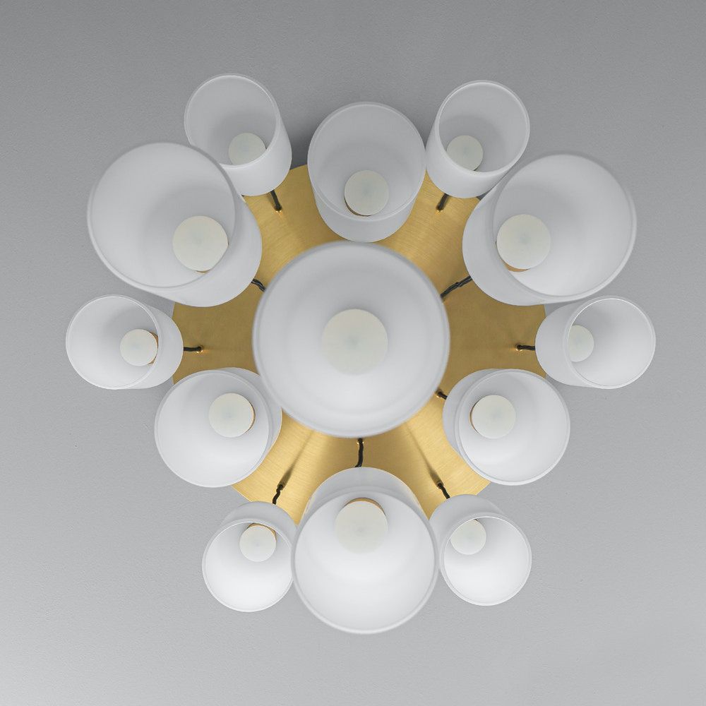 A luxurious chandelier by Schwung with translucent opal glass lampshades and a solid brass structure