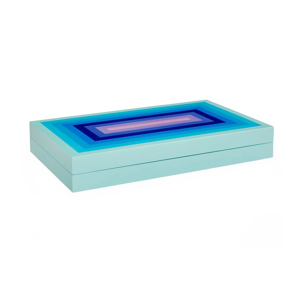 A luxury backgammon set by Jonathan Adler with a glossy finish and shades of blue and lavender